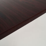 Table ovale, recouverte de placage de palissandre, années 70