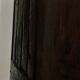 Antique walnut armoire with two doors.