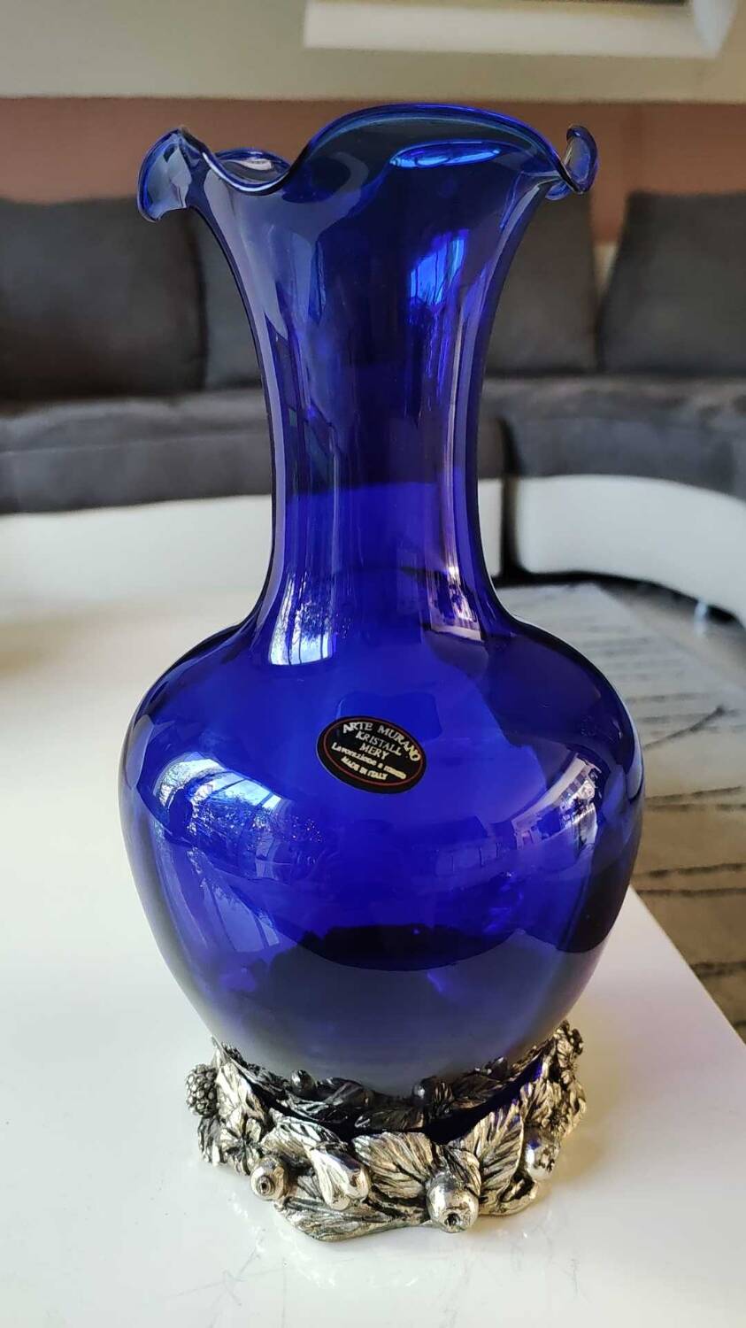 Corolle shaped vase in blown Art glass/Arte Murano Kristall Mery. Cobalt blue on a silver metal-look floral base. Dim 26 x 14 cm