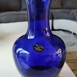 Corolle shaped vase in blown Art glass/Arte Murano Kristall Mery. Cobalt blue on a silver metal-look floral base. Dim 26 x 14 cm