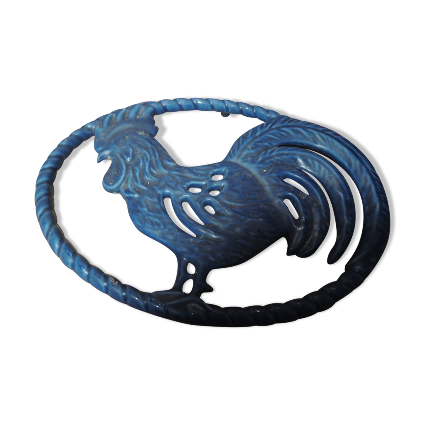 Blue cast-glass flat underside rooster pattern