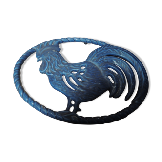 Blue cast-glass flat underside rooster pattern