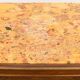 In-between furniture in marquetry decorated with a trophy decoration of musical instruments