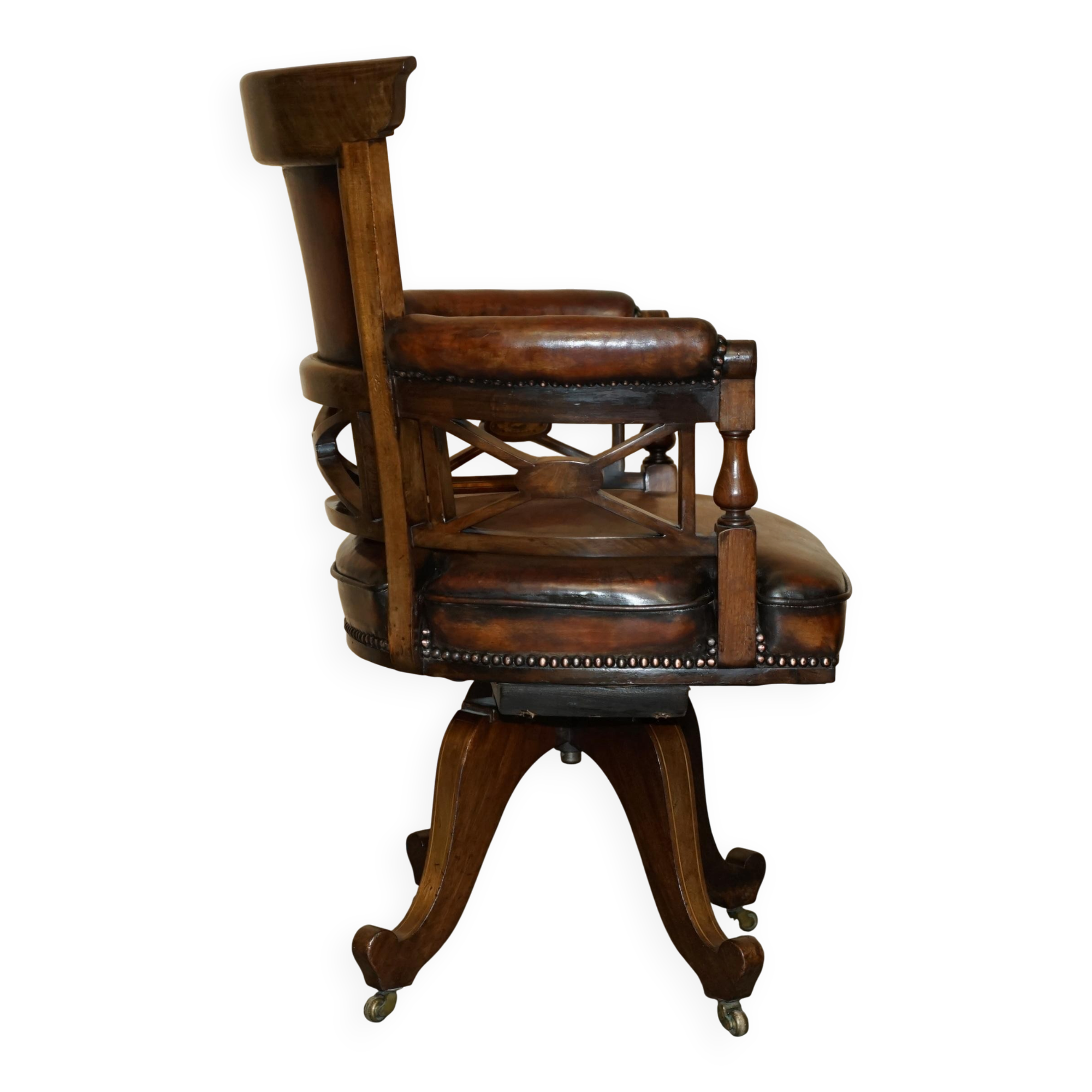 Victorian captain's chair in leather restored by Cornelius V Smith.