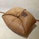 Light leather pouf sofa by Raphael Raffel for Honoré Paris