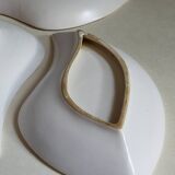 Three vintage free-form ceramic ravine dishes from the 1950s