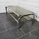 Chromed metal coffee table with smoked glass top from the 70s