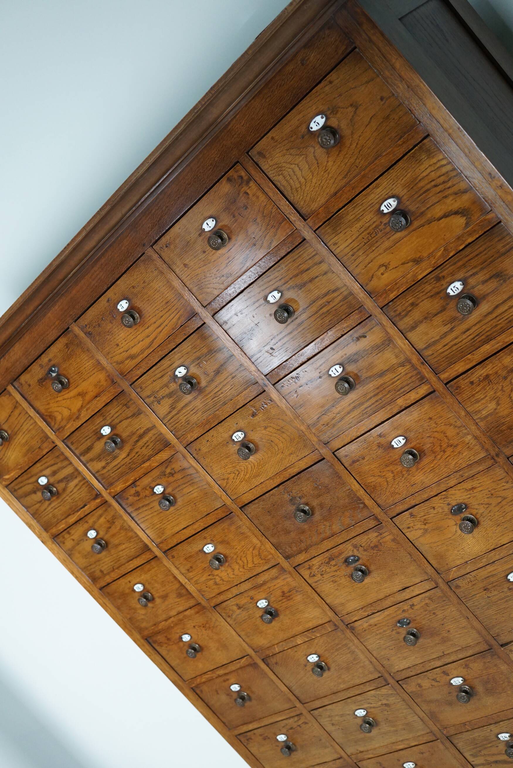 Large dutch oak apothecary cabinet / barber cabinet with enamel shields, 1900s