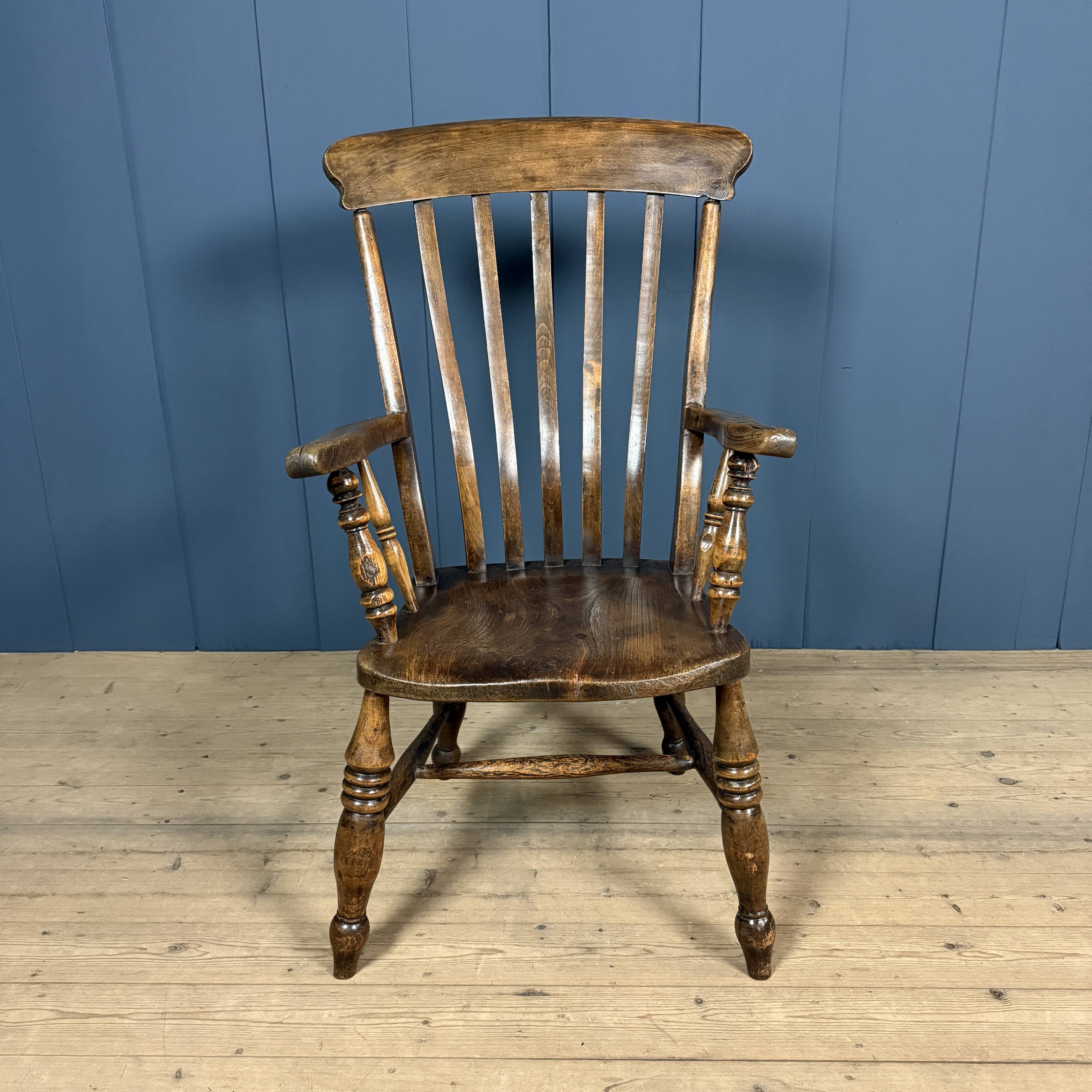 Brown English Windsor armchair with high back