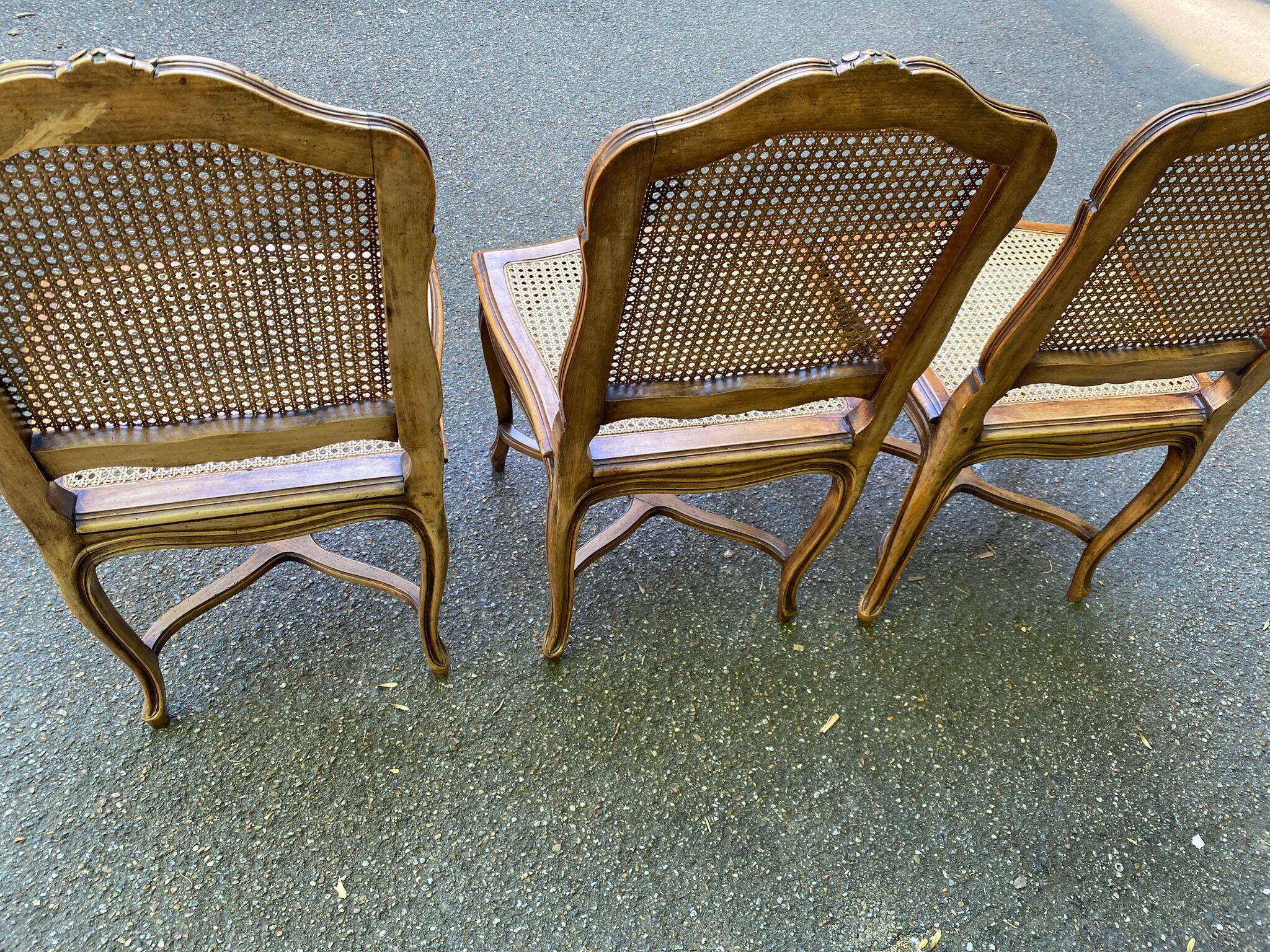 2 Louis XV style chairs in solid oak with rush seating from La Meublerie Meulin.