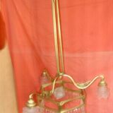 Art Deco period chandelier (1925) with four light arms.