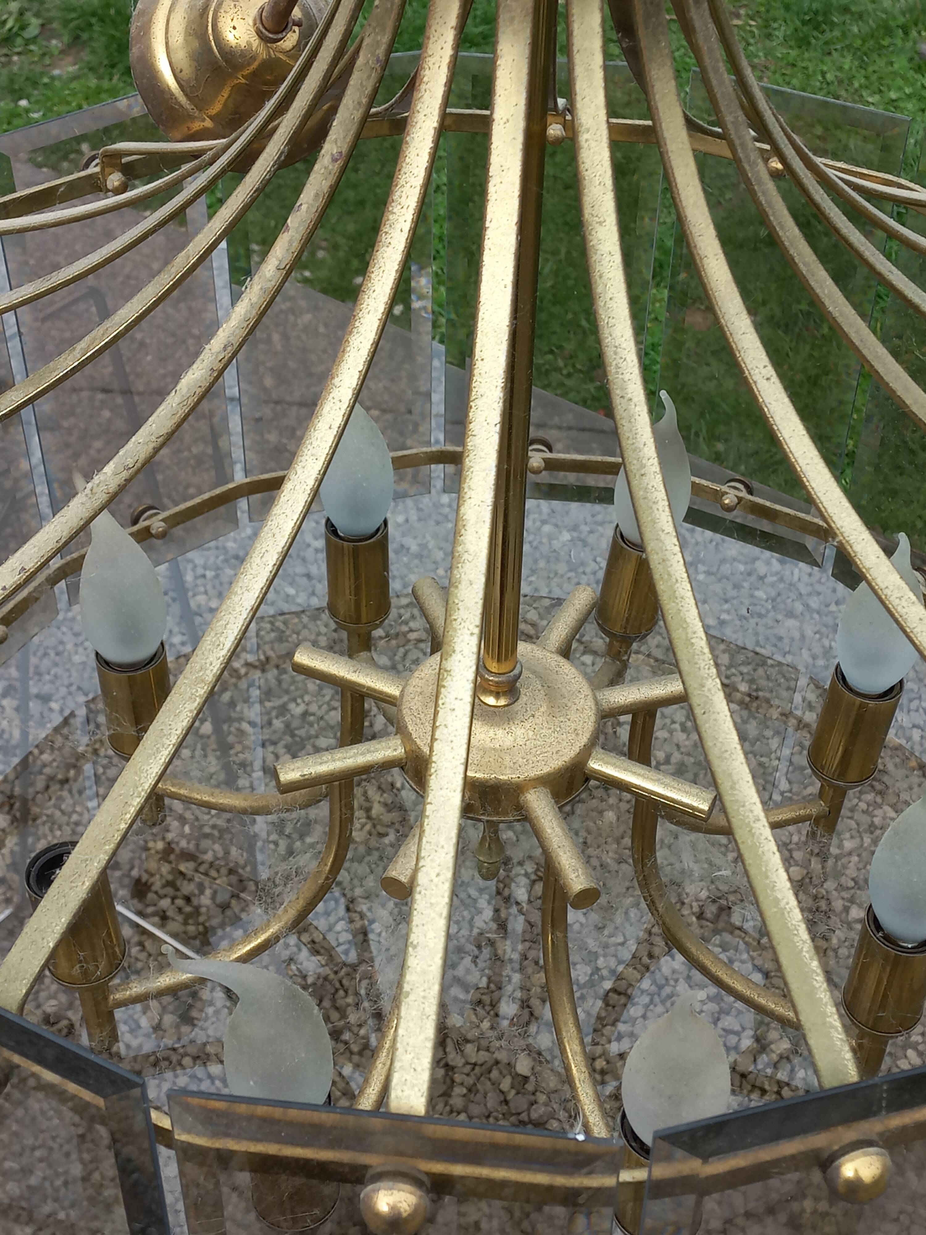 70s designer chandelier with smoked glass plates and gold metal frame