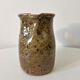 Old pitcher in pyrite stoneware
