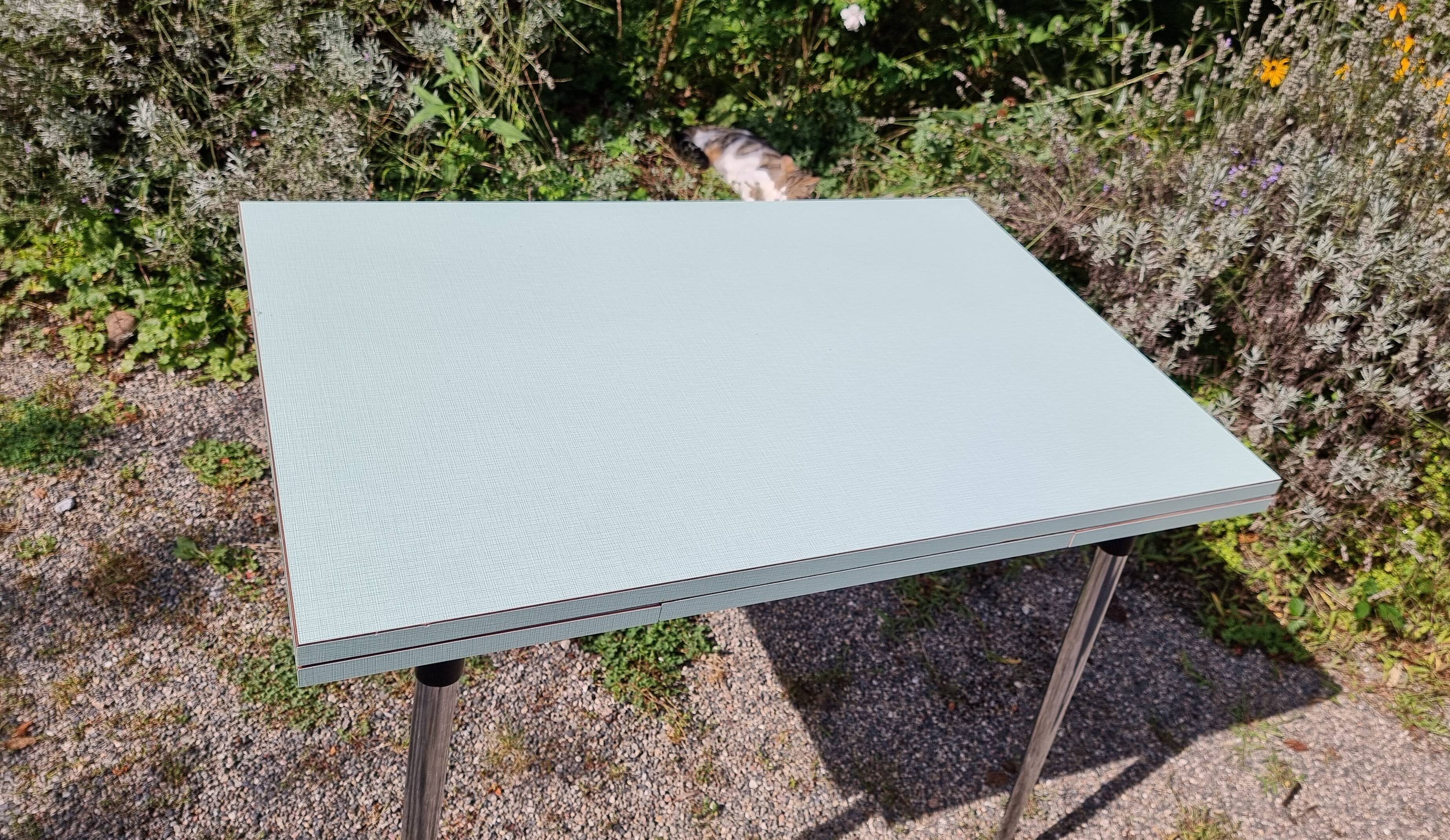 Water green formica table with 2 drawers and extensions