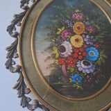Painted under glass convex medallion in bronze