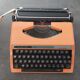 Machine à écrire Silver-Reed 280 orange vintage
