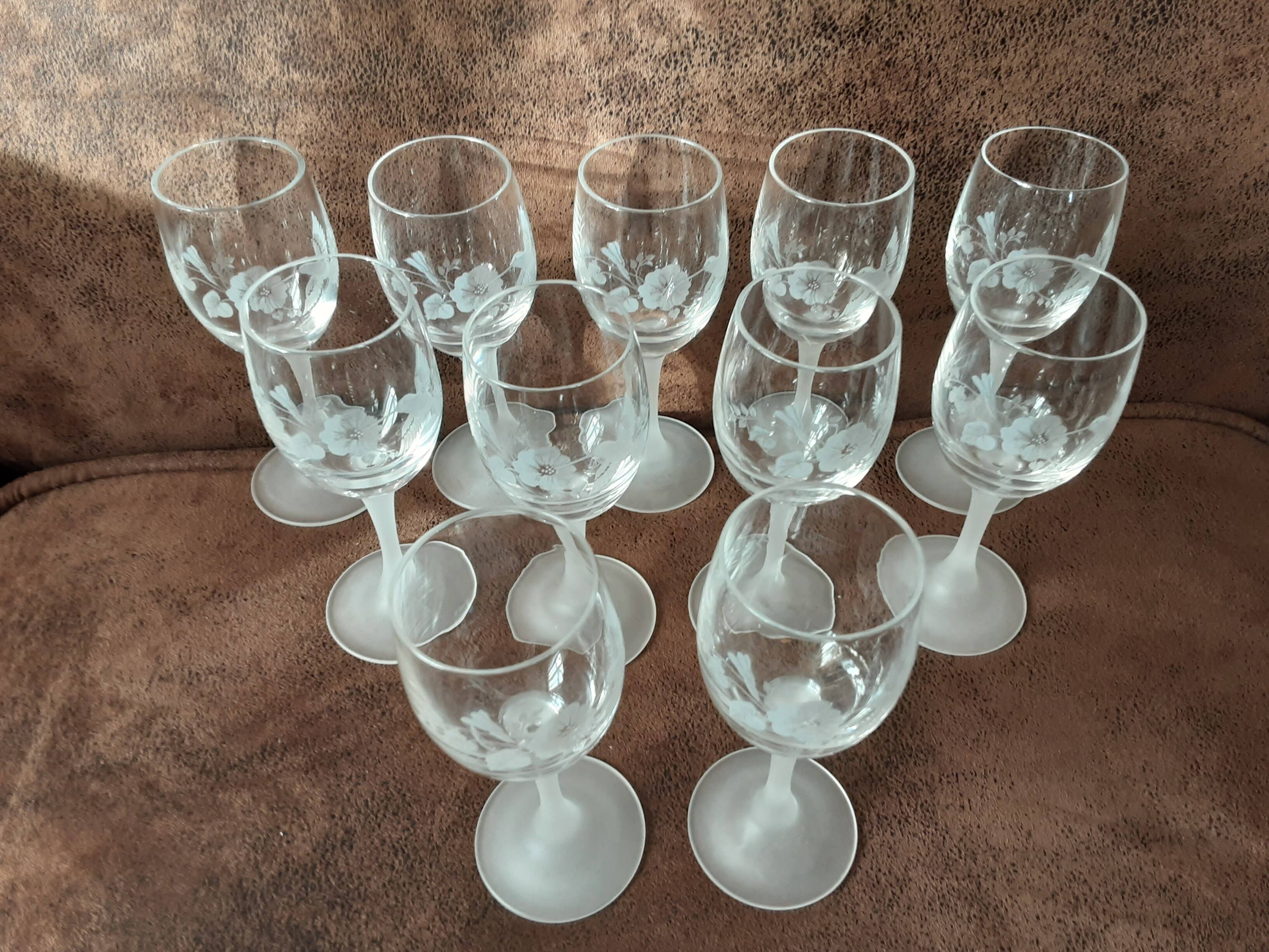 Set of 11 crystal footed digestif glasses