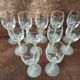 Set of 11 crystal footed digestif glasses