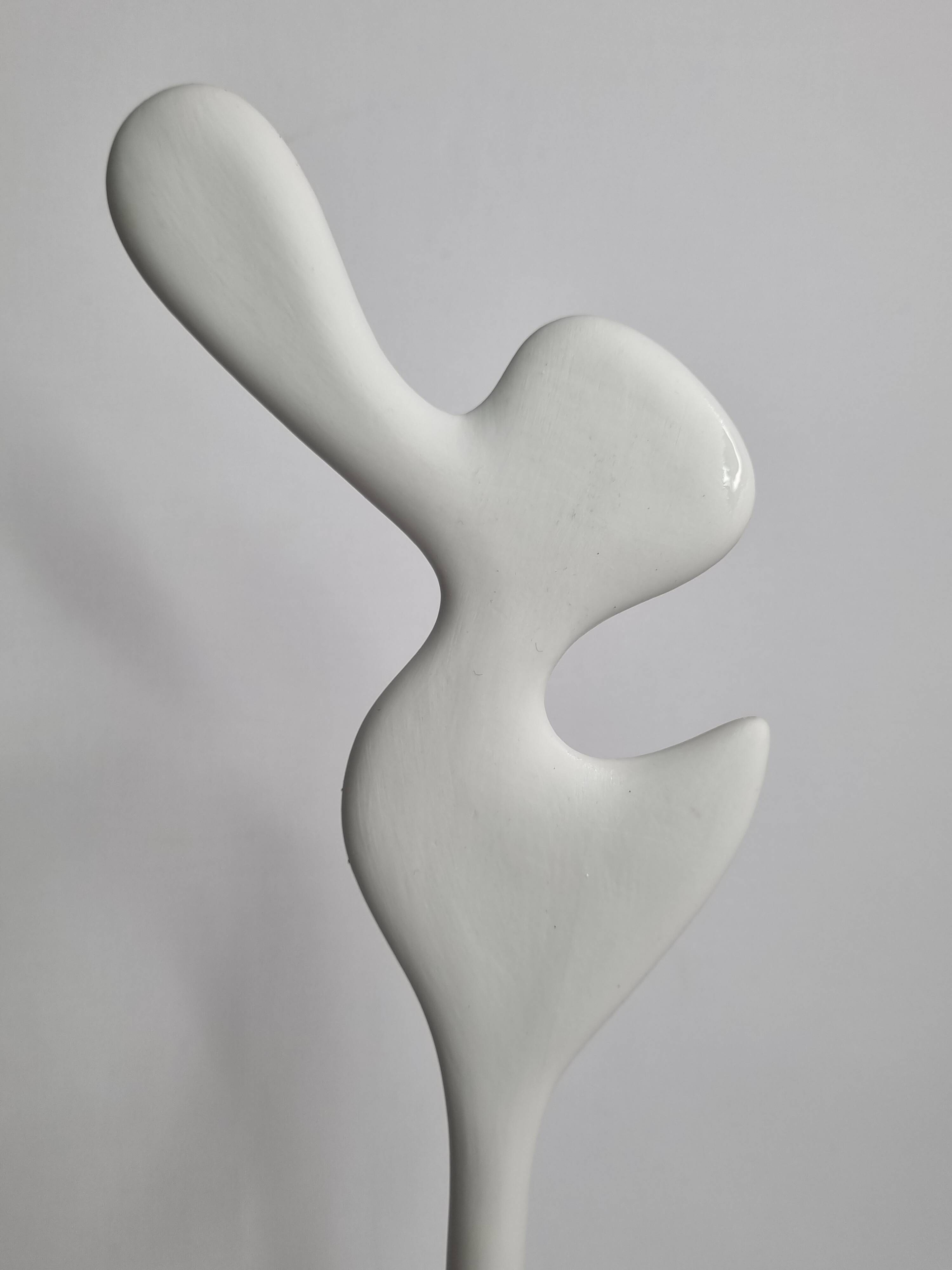 Biomorphic-inspired sculpture, on an industrial wooden base, 37 cm