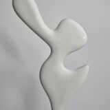 Biomorphic-inspired sculpture, on an industrial wooden base, 37 cm