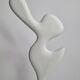 Biomorphic-inspired sculpture, on an industrial wooden base, 37 cm