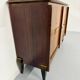 Antique art deco sideboard from the 1930s with veneered wood and bronze insert