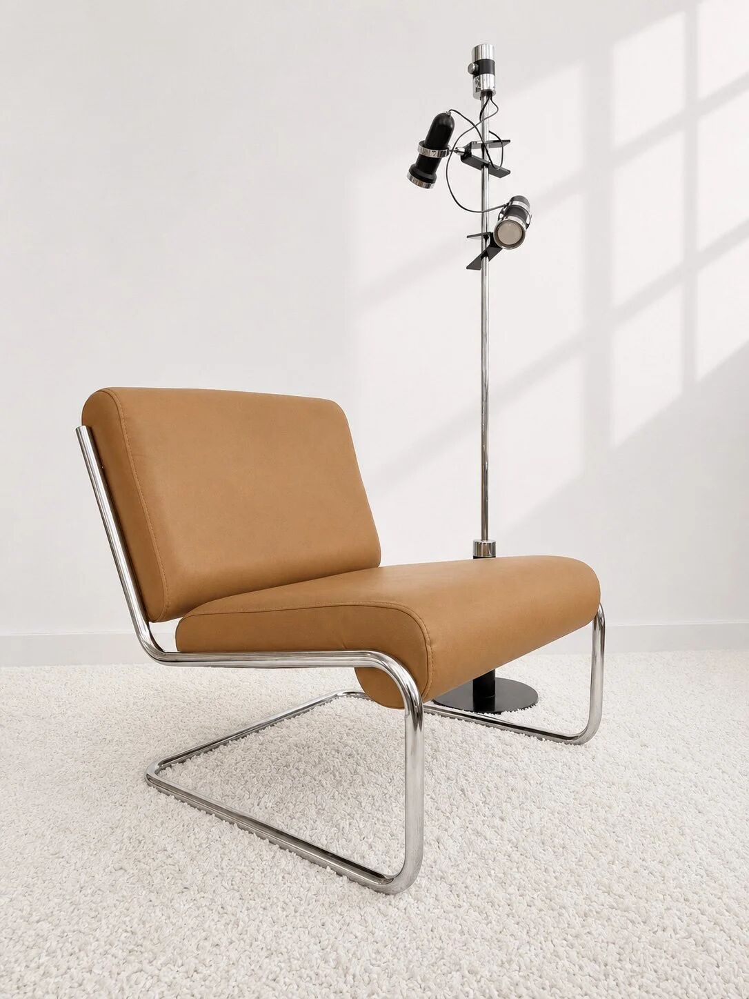 Vintage cantilever armchair. Brown faux leather upholstery. 60s