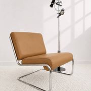 Vintage cantilever armchair. Brown faux leather upholstery. 60s