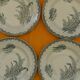 Set of 4 flat plates in saint amand earthenware. lily of the valley decor.