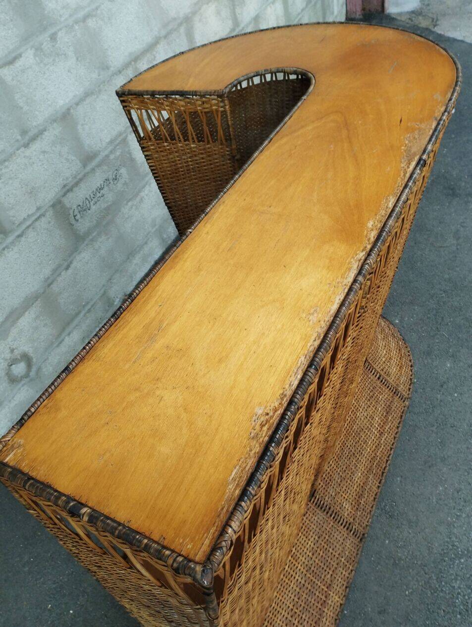 Vintage rattan and metal bar and its stools.