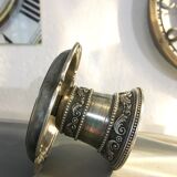 Chiseled silver metal candle holder