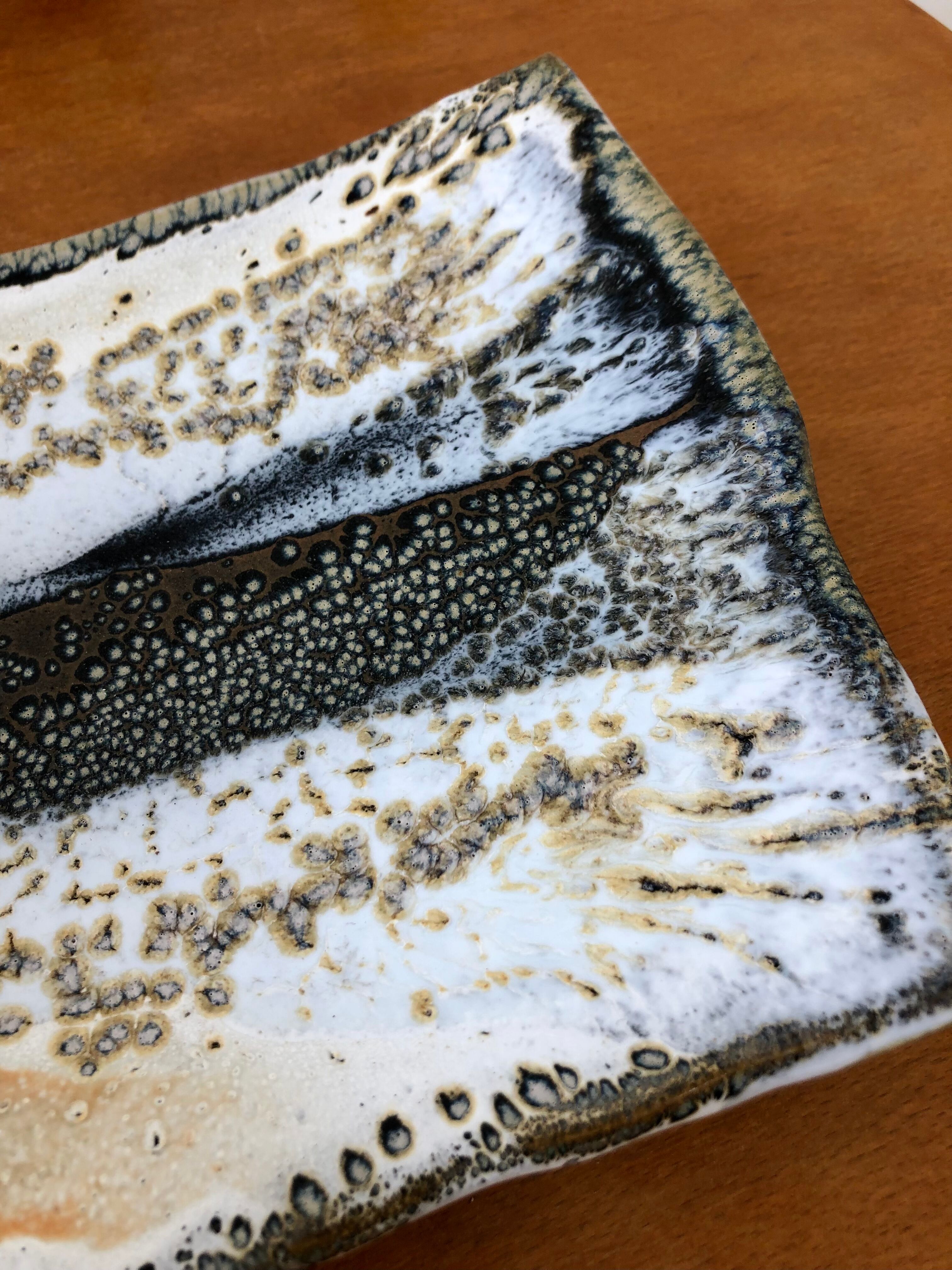 Cup in enamelled sandstone signed