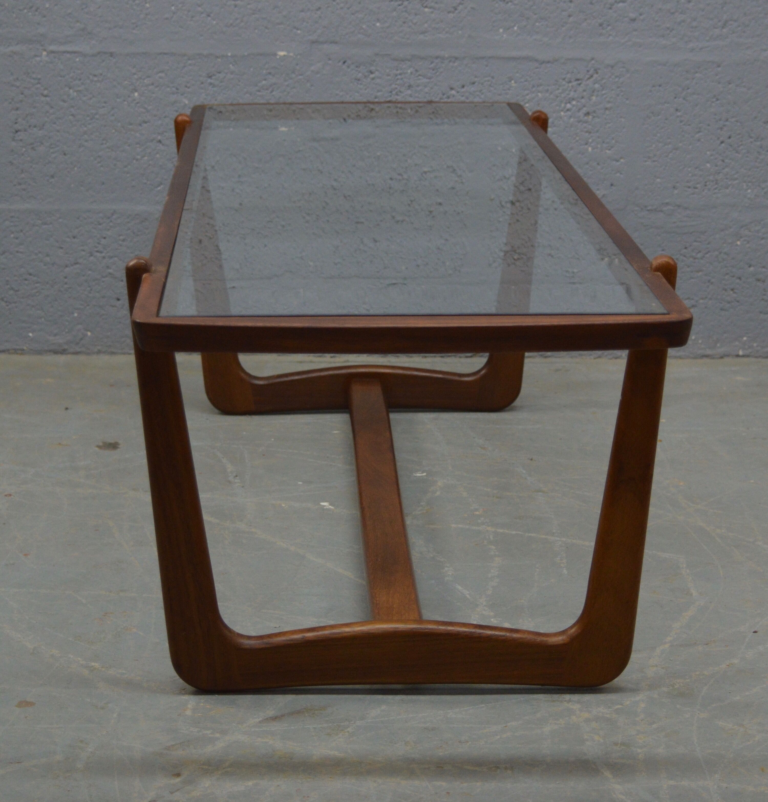 Mid century glass topped coffee table