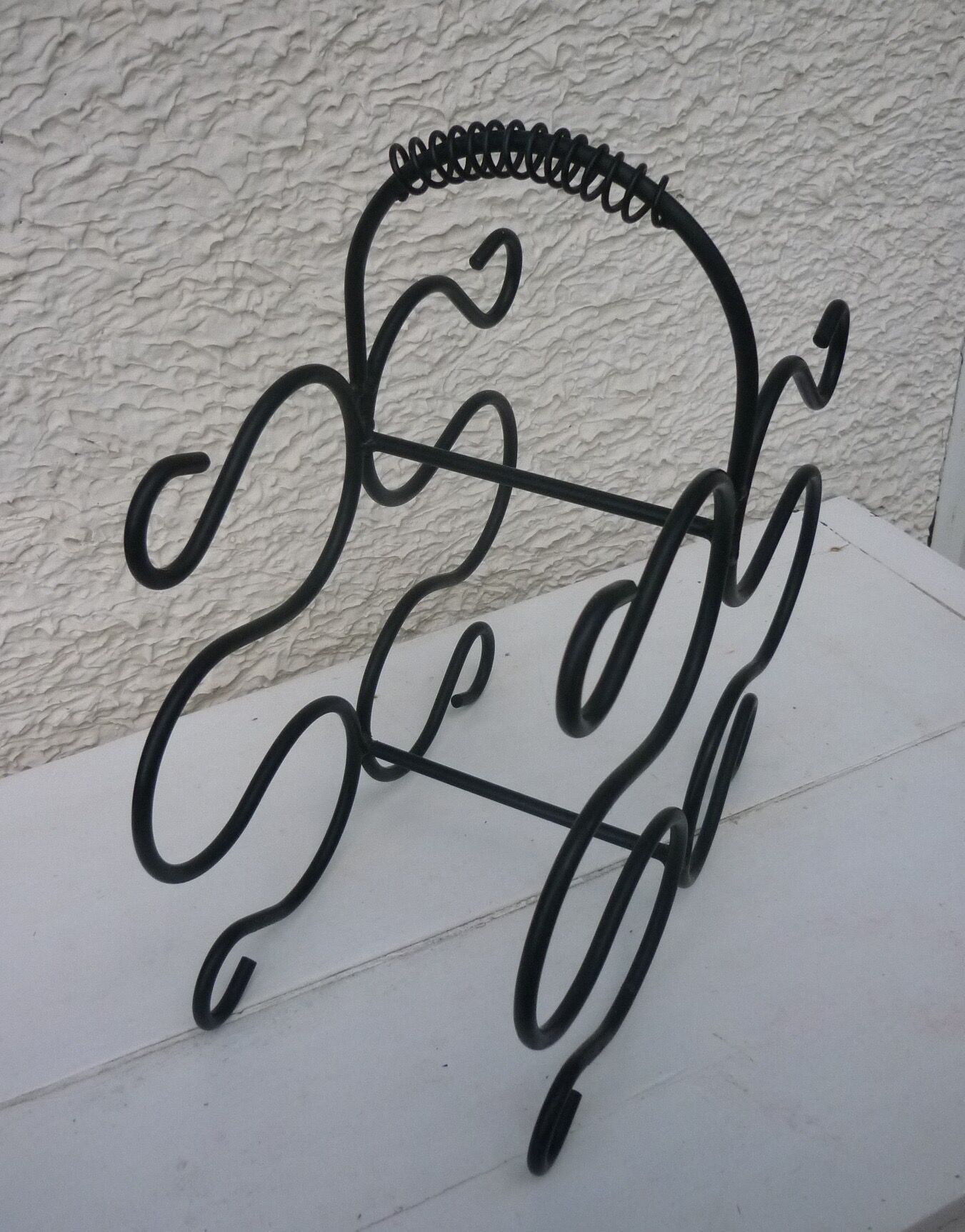 Door bottles in wrought iron