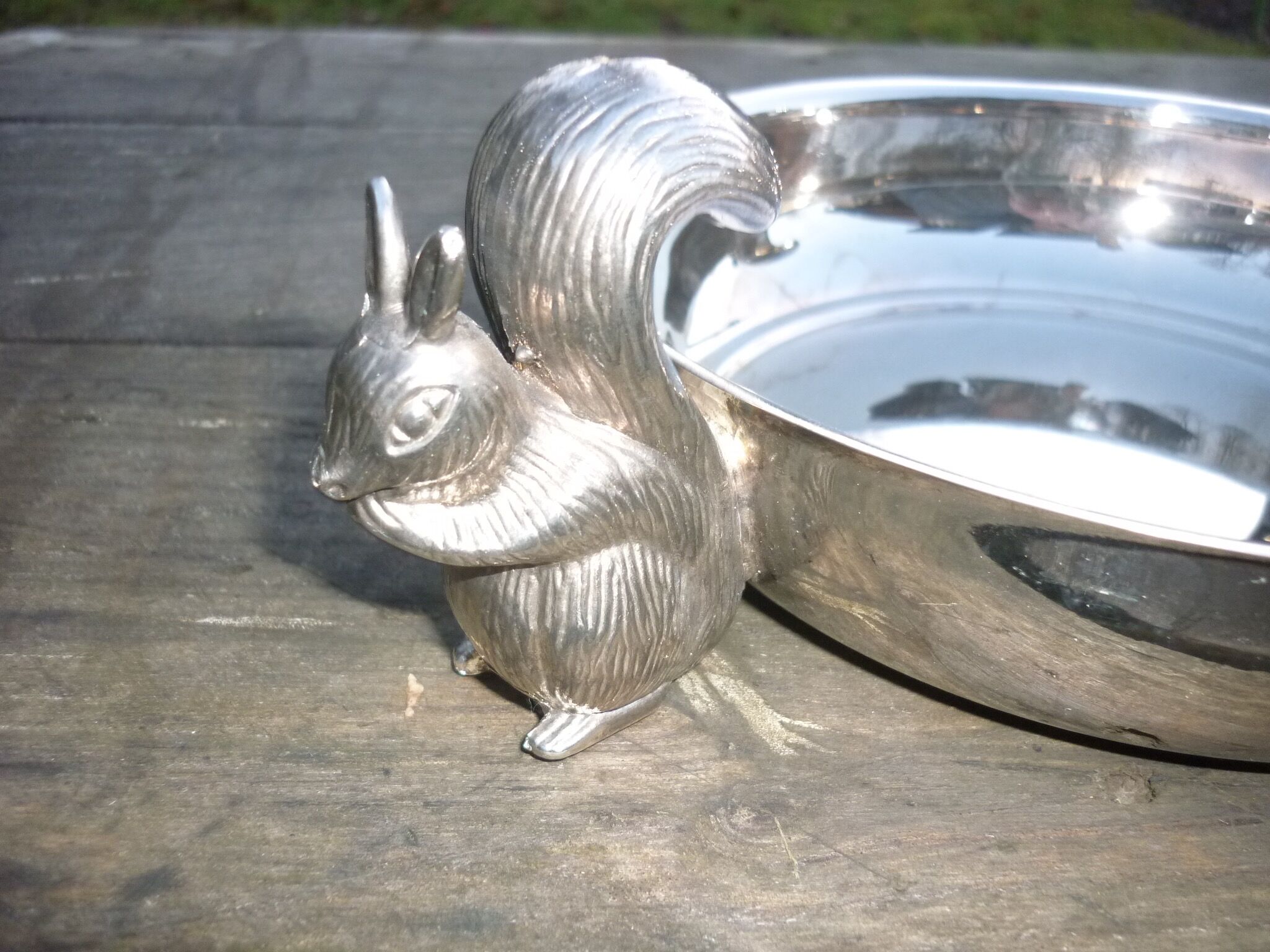 Silver metal dish with squirrels