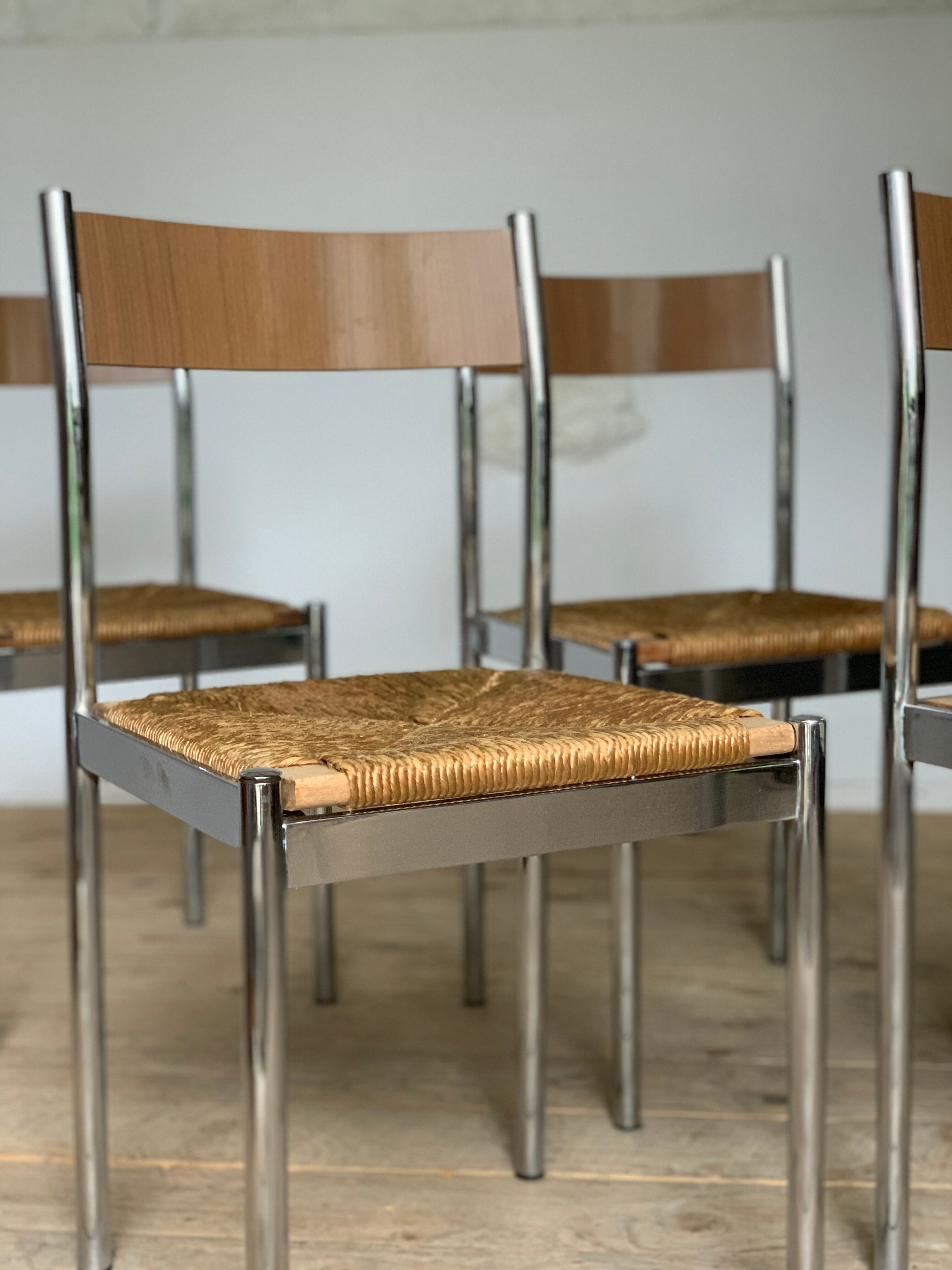 4 chrome and straw chairs