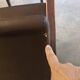 Armchair and faux leather footrest