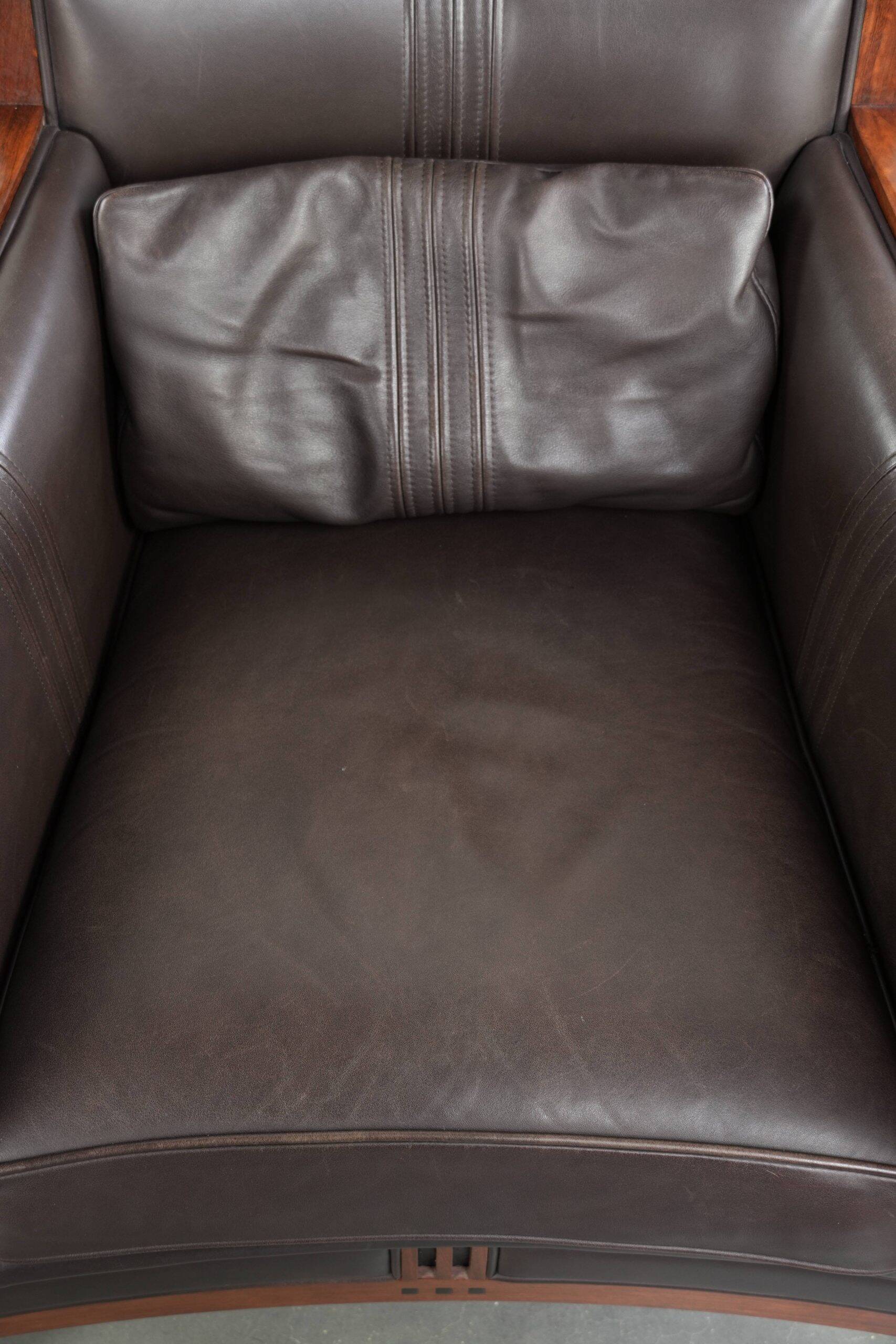 Art Deco design armchair with dark brown cowhide upholstery