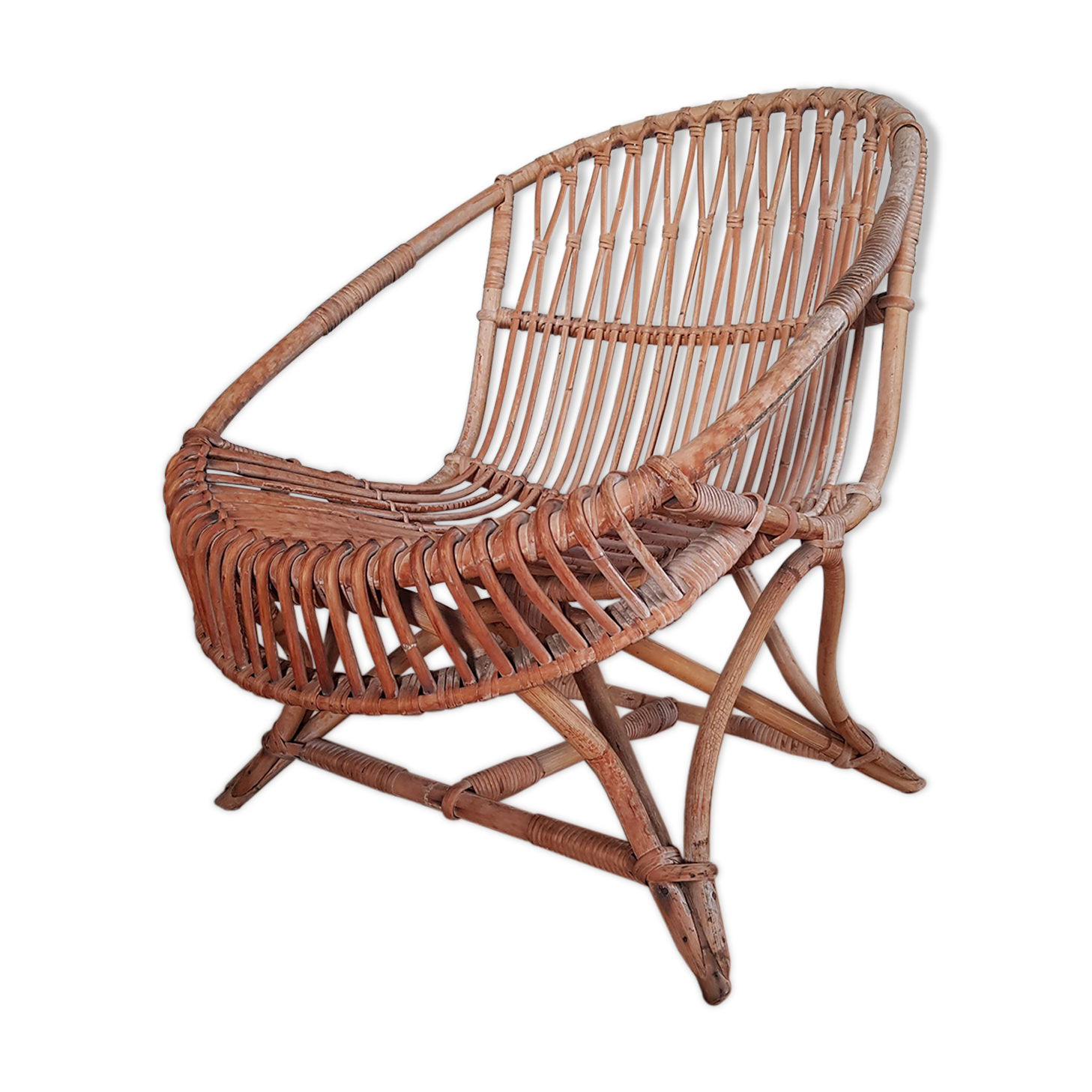Vintage rattan armchair original shell shape
