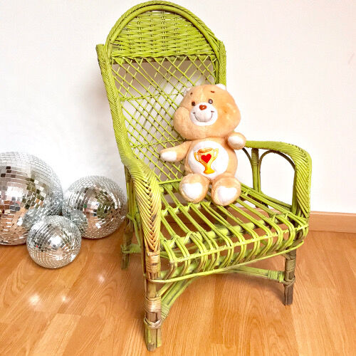 Children's chair in green rattan