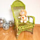 Children's chair in green rattan