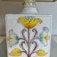 Lampe de table en faïence à décors d'oiseaux et de fleurs