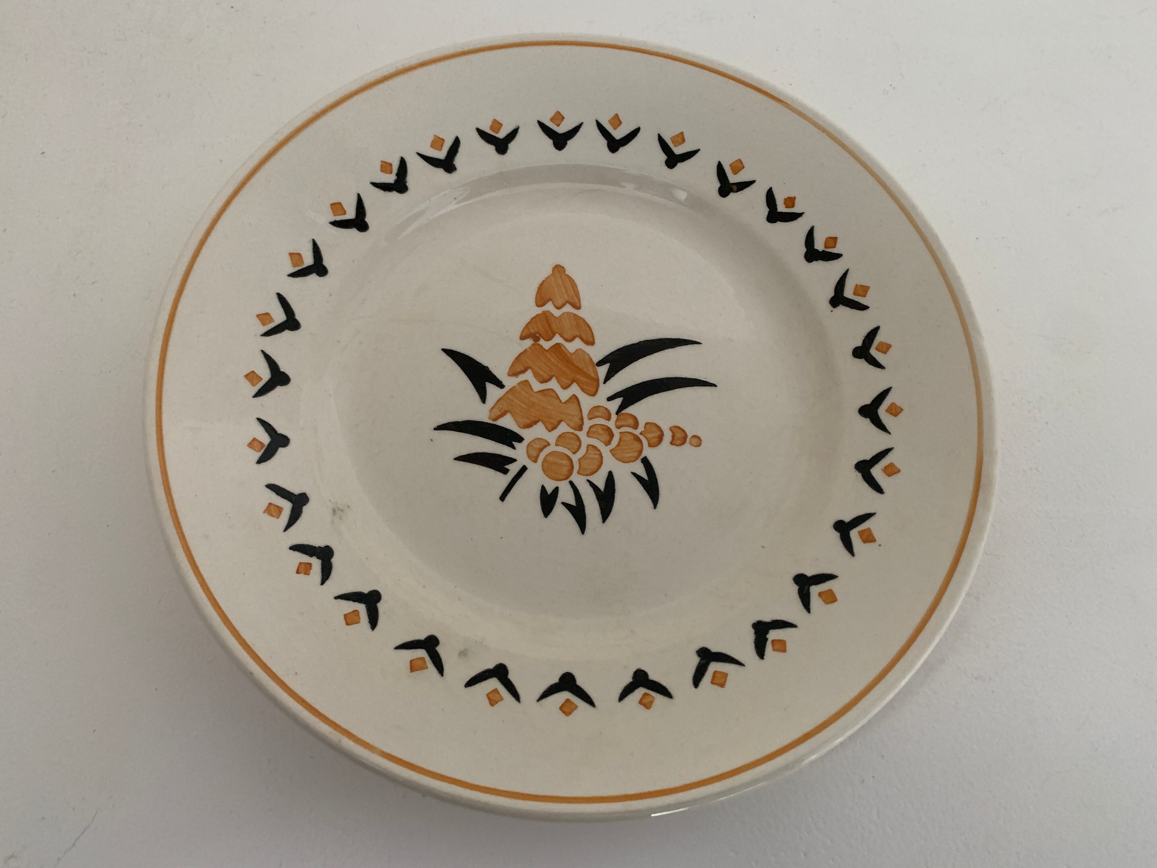 7 dessert plates and one Longwy dish