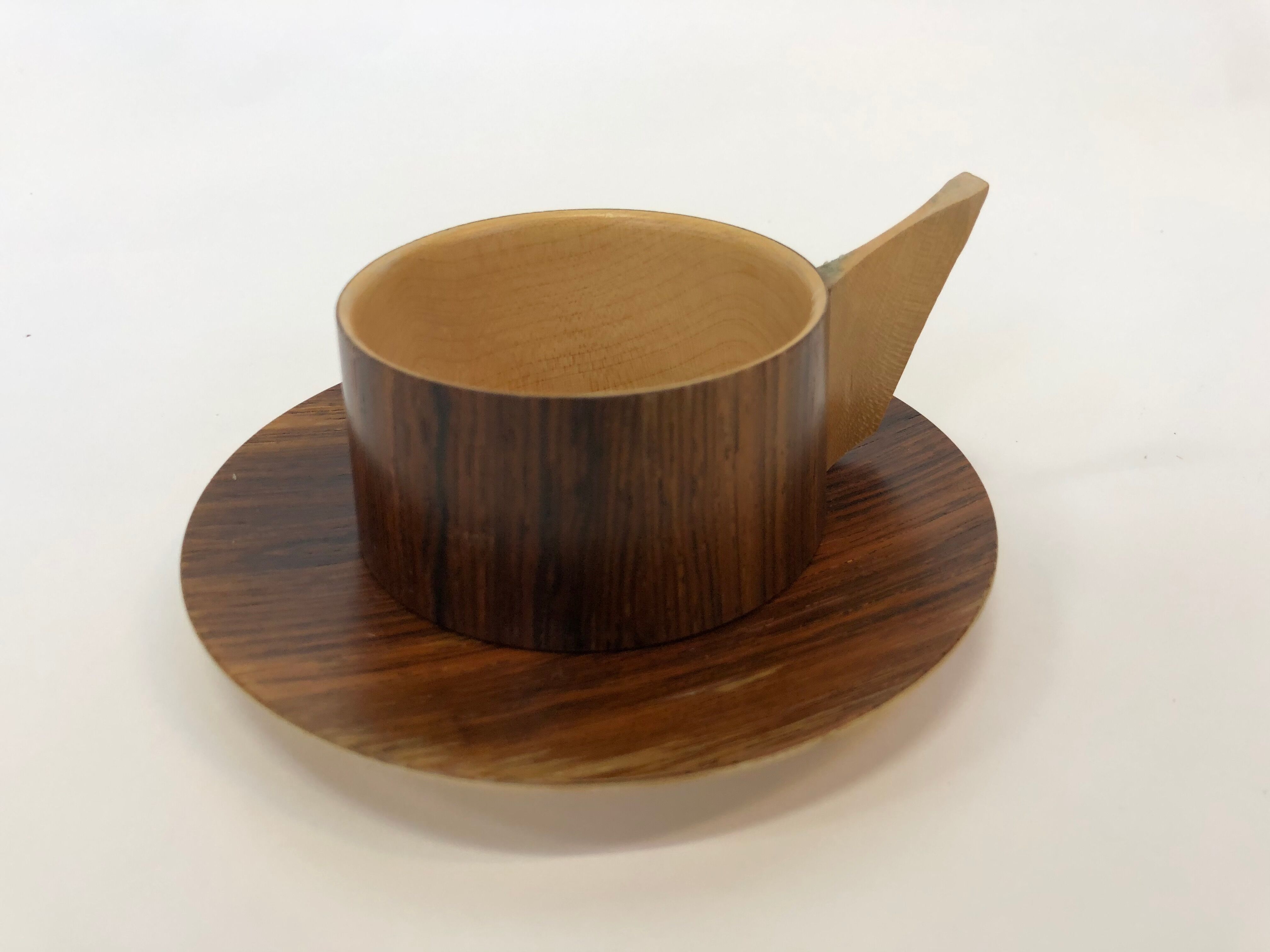 Vintage wooden cups and saucers in teak