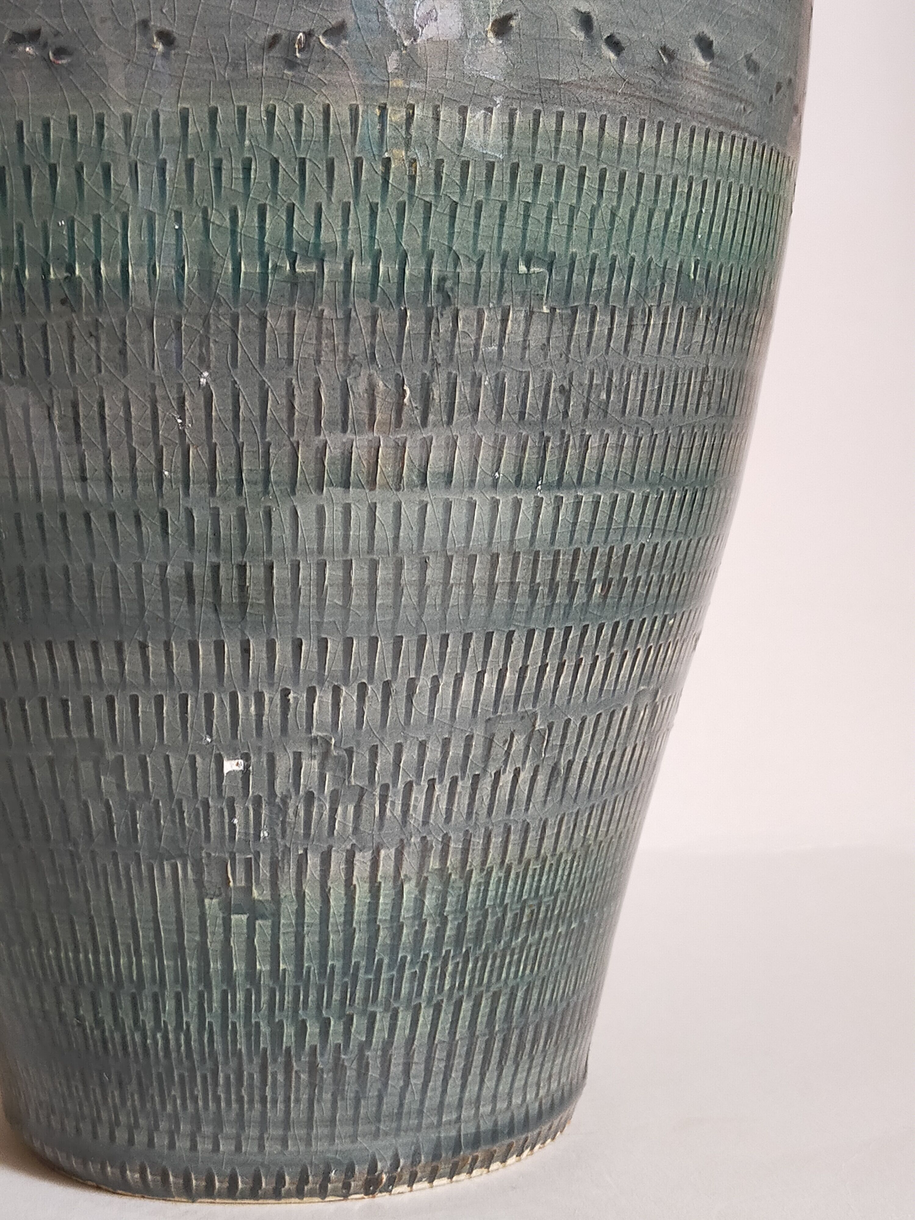 Oblong ceramic vase sacrificed with blue enamel