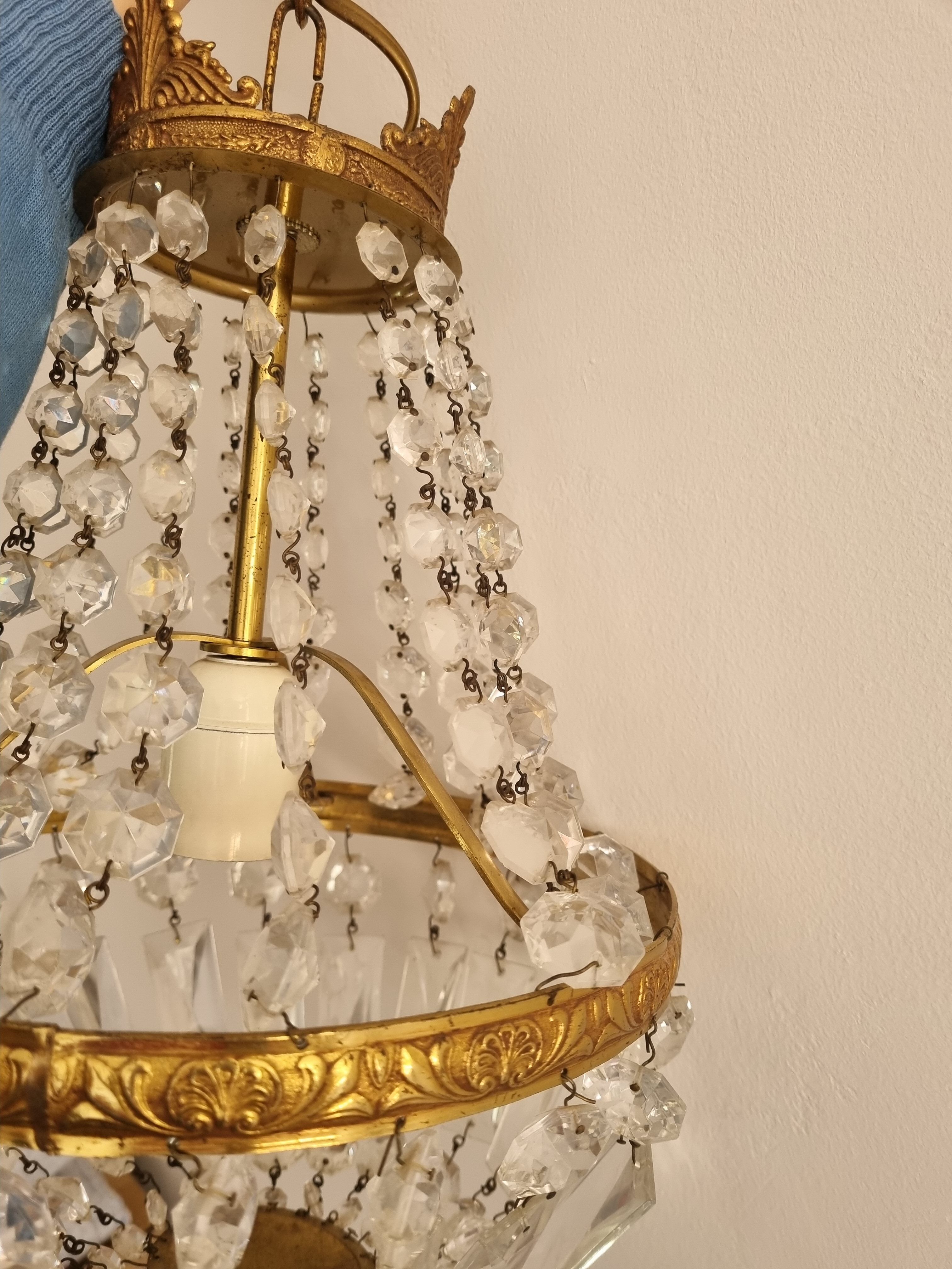 Brass chandelier and grapevine glass