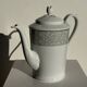 Bavarian porcelain teapot from Germany with blue frieze and flower lid H23