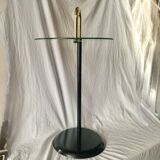 Old designer side table in tempered glass and black and gold metal