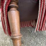 Old raspberry velvet toad armchair