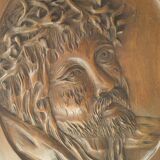 Face of Christ carved on wood